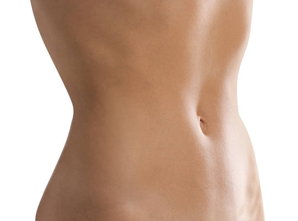 istock Woman with flat belly on white background, closeup 2247094101
