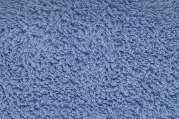 Soft blue fuzzy sherpa fleece fabric background