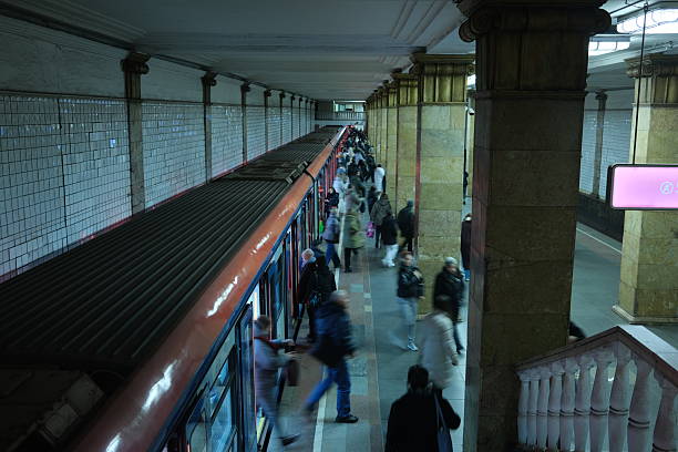 People on metro platform, getting in and out of the train wagons, public transportation in big cities, crowd of people