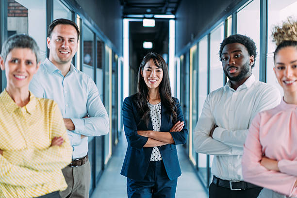 istock Confident businesswoman and her team. 2247099179