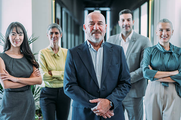istock Confident businessman and his team. 2247099187