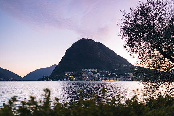istock Lugano city skyline and lake at twilight 2247099397