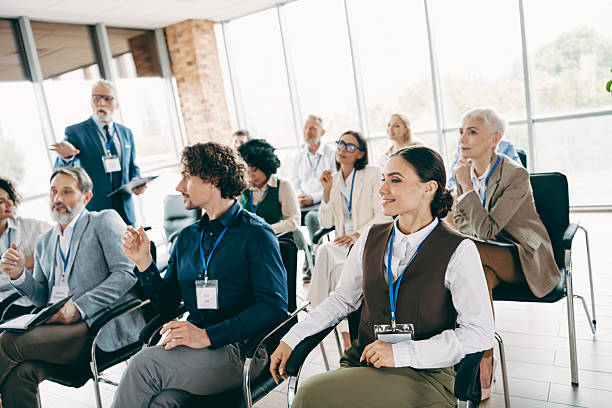 istock Diverse group of professionals attending a training session in a well-lit modern conference room setting 2247100199