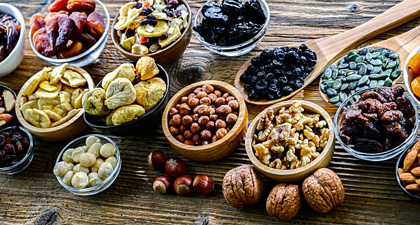 istock Composition with a variety of dried fruits and assorted nuts. 2247101101