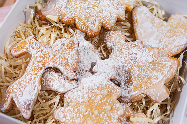 istock Christmas cookies in box on straw filler 2247101278