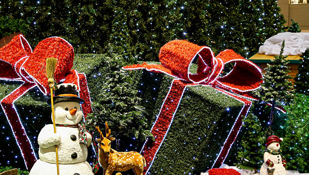 istock Christmas decorations. Snowman and gifts. 2247105540