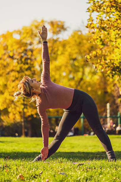 istock Exercising in park in autumn 2247109030
