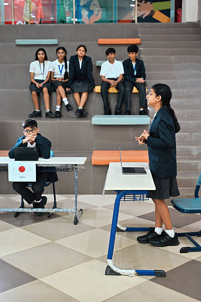istock Girl Student Delivers Confident Speech During Model UN Session 2247109499