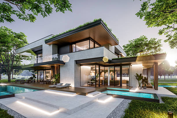 istock 3d rendering of two-story house with concrete facade in evening 2247109890