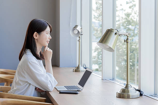 istock Asian woman working in coworking space 2247112445