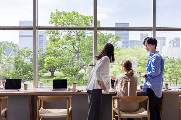 Group of Asian people working in coworking space