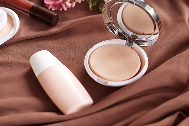 istock editable foundation and opened powder mockup design on brown background 2247114400