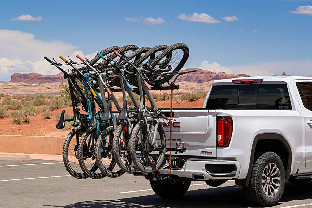 Home bicycle repair. A man assembles a bicycle at home. Do-it-yourself bicycle repair.