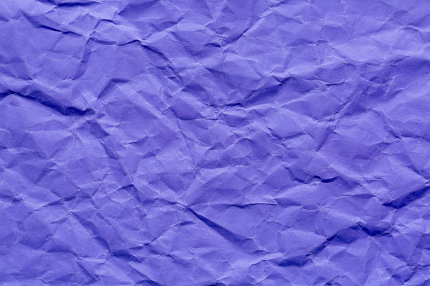 istock Purple paper texture, wrinkled, macro,Abstract light purple paper texture background. Texture of crumpled craft paper. Paper background. Recycled lavender paper backdrop in close up. Lilac Textures. Wallpaper. Newspaper 2247125023