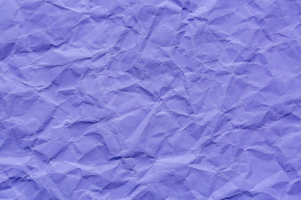istock Purple paper texture, wrinkled, macro,Abstract light purple paper texture background. Texture of crumpled craft paper. Paper background. Recycled lavender paper backdrop in close up. Lilac Textures. Wallpaper. Newspaper 2247125028