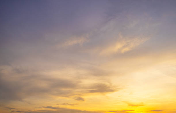 istock Clouds and orange sky backdrop,Sky,sunset, beautiful , luxury soft gradient orange gold clouds and sunlight on the blue sky perfect for the background, Sunrise on morning or everning in winter warm time ,Twilight summer,silhouette 2247125106
