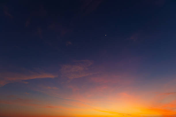 istock Clouds and sky backdrop at sunset and sunrise,Sunset Sky Clouds in the evening with Red, Orange, Yellow and purple sunlight on Golden hour after sundown, Romantic sky in summer on Dusk Twilight 2247125158