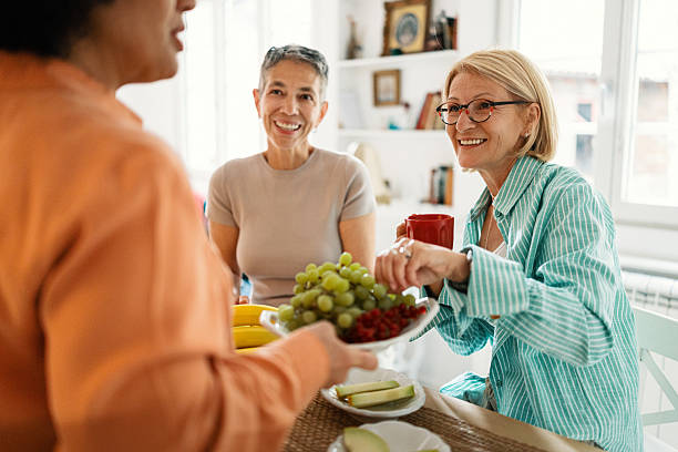 istock Mature woman sharing experiences with girlfriends 2247125292