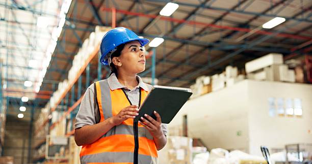 istock Warehouse, supervisor and woman with tablet, logistics and stock inventory with web or supply chain. Shipping, factory and person with tech for quality assurance, think and planning for distribution 2247125532