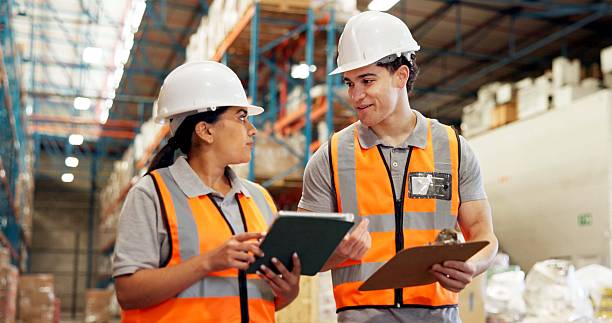 istock Warehouse, distribution and people on tablet for supply chain, delivery schedule and inventory checklist. Shipping, teamwork and workers on digital tech for online logistics, meeting and inspection 2247125543