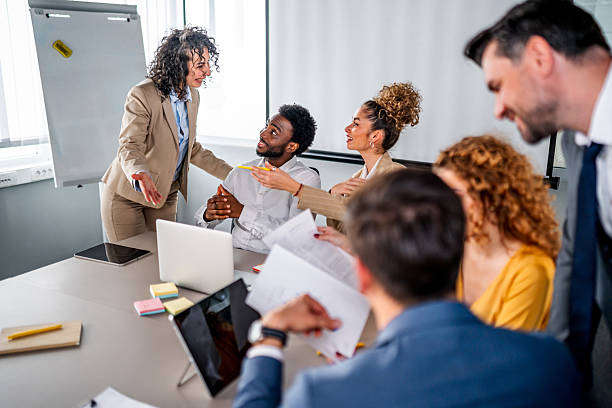 istock Business professionals discussing project during office meeting 2247129063