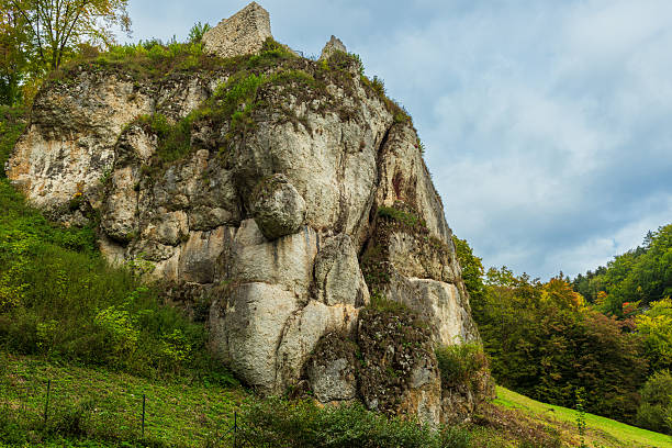 istock Massive limestone cliff with ancient ruins on the summit 2247131545