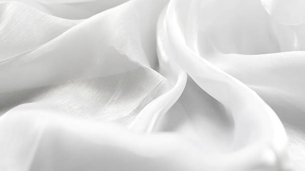 istock White tulle textile background with soft folds creating gentle minimal aesthetic 2247131639