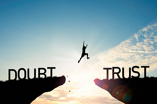 istock Silhouette of a person jumping from doubt to trust representing confidence courage decision making motivation personal growth and overcoming fear ideal for business leadership and self improvement 2247133426