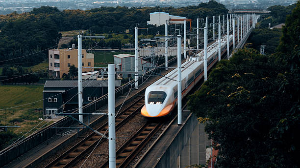 High-speed rail train traveling on elevated track in Taiwan, symbolizing modern transportation, connectivity, and sustainable travel