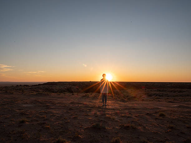 A woman enjoying solitude on the wasteland