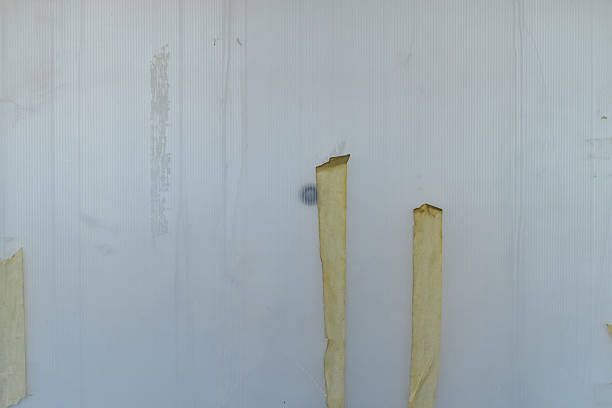 istock Close-up of the door with cover which is under construction. 2247142103