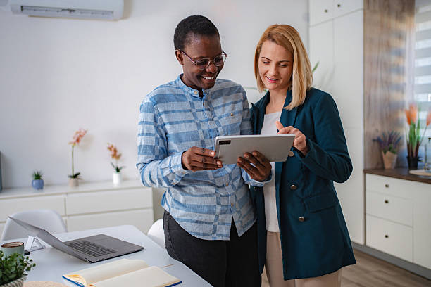 istock Diverse women colleagues collaborating on digital tablet in modern office 2247143394