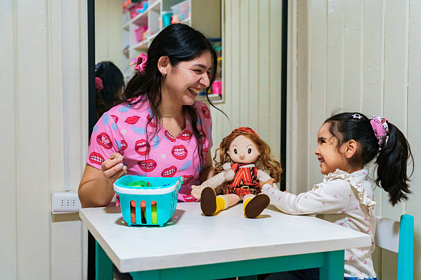 istock Latin american speech therapist playing with child during therapy 2247143856