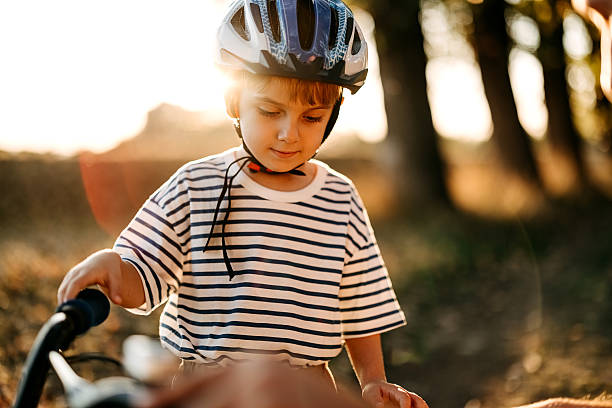 Young boy riding his bicycle