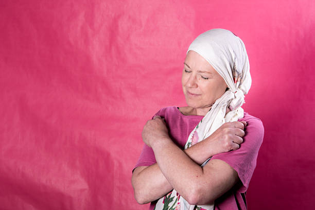 istock Woman with Headscarf Embracing Herself 2247156258