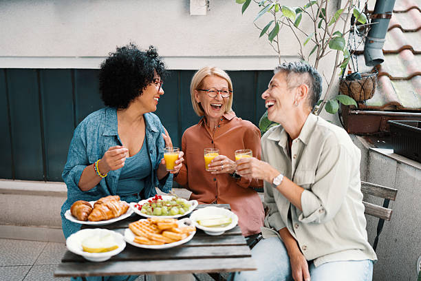 istock Mature Women Bonding Over Brunch on a Sunny Terrace 2247157662
