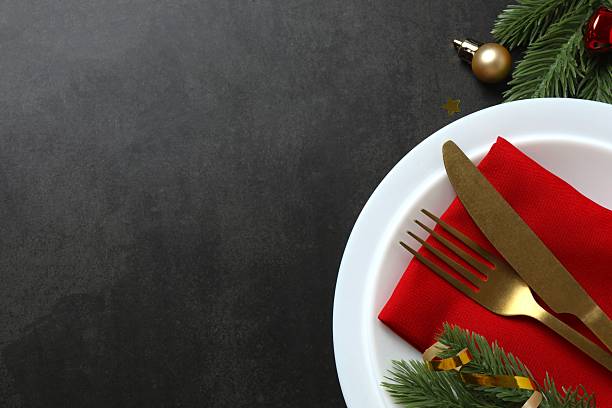 istock Top view of New Year table setting on dark background 2247158198