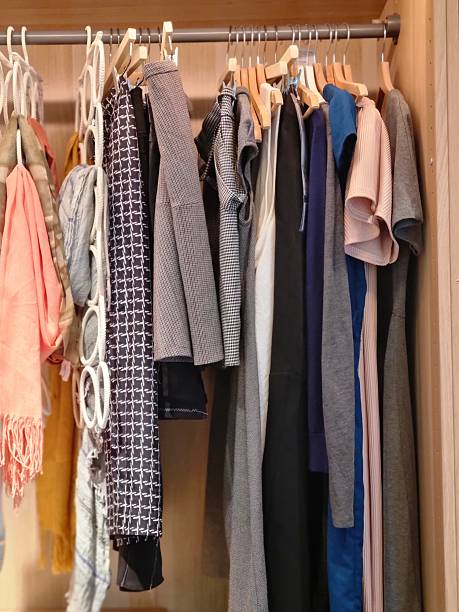 istock Modern Organized Wardrobe with Hanging Clothes 2247158415