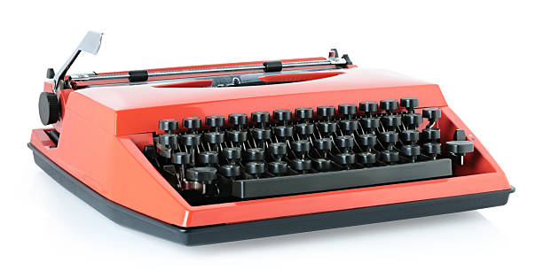 Red vintage typewriter isolated on a transparent background. Retro office machine perfect for writing concepts, literature themes, creative design, and nostalgic projects