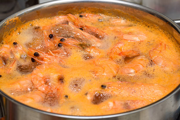 istock Close up shrimp in a metal pot with boiling water. 2247164831