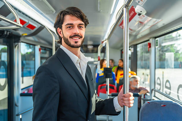 istock Smiling man commuting by bus for daily travel 2247168236