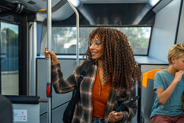 istock Young woman commuting on public transport bus 2247168371