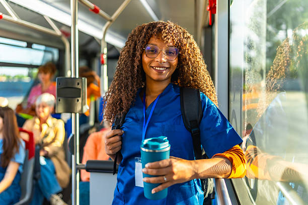 istock Healthcare worker commuting to work on a public bus 2247168465