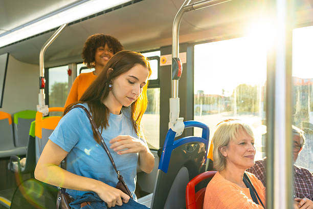 istock People traveling by bus on a sunny day 2247168685