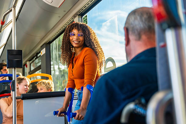 istock Woman with crutches smiling on public bus 2247168759