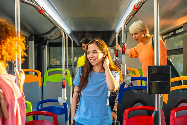 istock Passengers commuting by bus, enjoying public transportation 2247168952