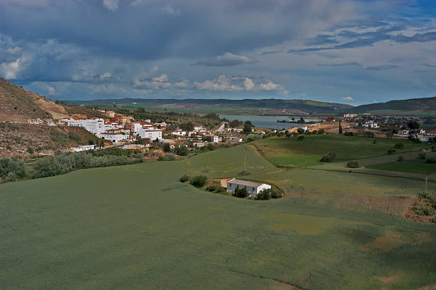istock Arcos de La Frontera village landscape with lake and green fields 2247169212