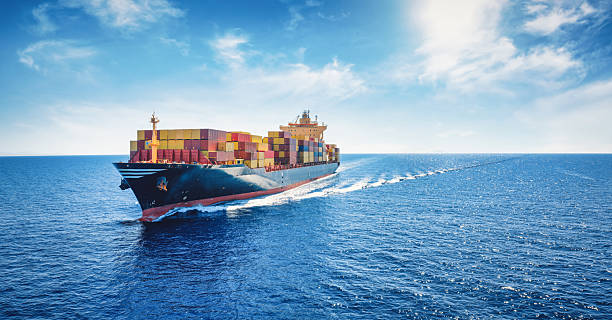 istock Aerial panorama of a cargo ship carrying container for import and export 2247169517