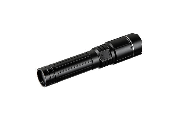 istock Sleek black tactical LED flashlight with a lens and push button, isolated on white background. 2247172004