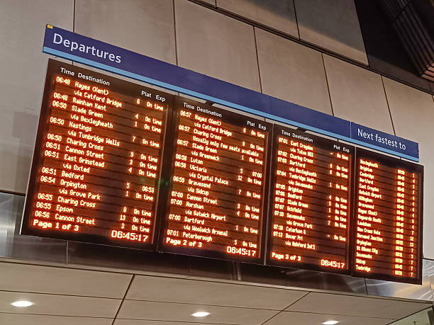 istock LED Train Departures Board at Busy Railway Station Concourse, Real Time Timetable 2247173317